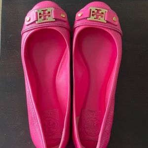 Tory Burch flats with gold logo.